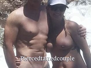 Piercedtattedcouple